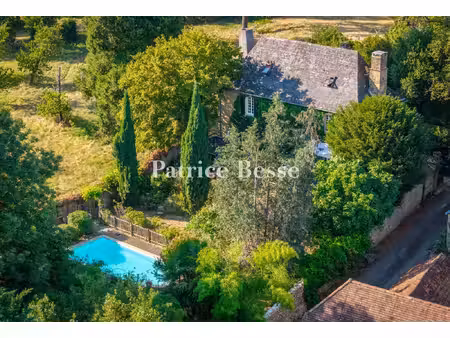 entre haut quercy et corrèze  au calme d'un petit village  un presbytère à usage...