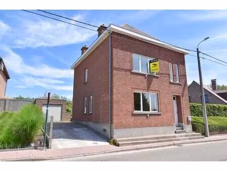 ruime woning met garage en grote tuin