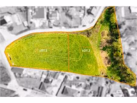 vaste parcelle de +/- 2.638 m² en zone d'habitat