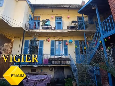 charmante maison de ville avec surface commerciale . idéale investissement ou habitation