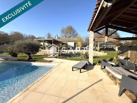 maison plain pied – cadre privilégié avec piscine   garage