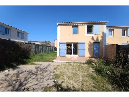 maison de 83m² de type 4 avec garage situé au centre-ville de