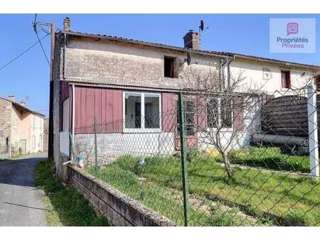 maison de bourg mitoyenne à rénover sur 2 niveaux avec cave