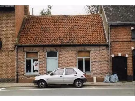 te renoveren woning met brede gevel van 7 5 m  grote tuin en uitzonderlijk potentieel in d