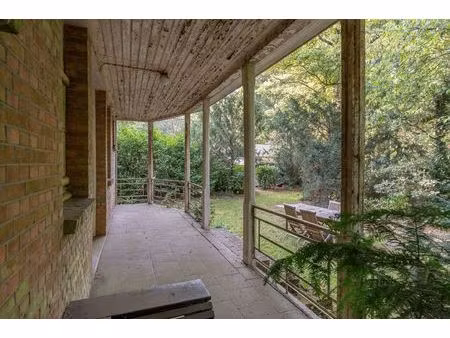 bouwgrond / grondig te renoveren woning op 7.106m² grond.