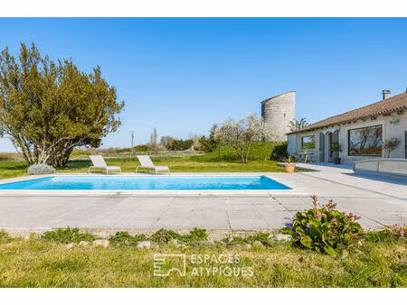 propriété de charme avec son moulin regardant l'estuaire