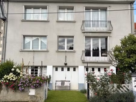 immeuble de rapport évolutif de 200 m2 habitable avec garages  jardin et potentiel d’aména