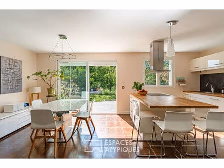 maison en bord de seine avec terrasses et jardin bucolique
