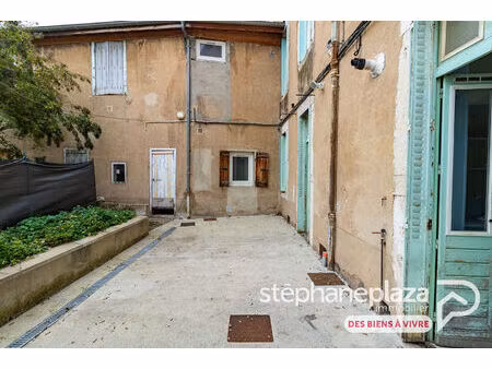 appartement 5 pièces 106 m² en rdc - terrasse et caves - copro bénévole