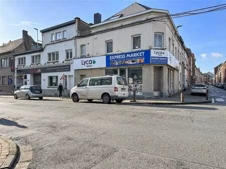 immeuble de rapport : commerce + 2 appartements