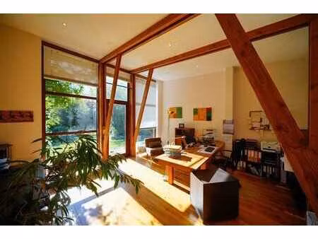 villa plain-pied sur un terrain de fond avec vue sur champs