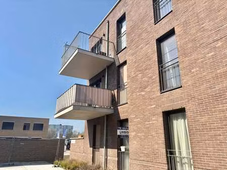 gelijkvloers 2-slaapkamer appartement met terras