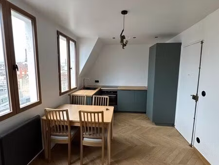 métro boucicaut - t2 refait à neuf 30m2 avec vue dégagée sur paris - tour eiffel  défense 