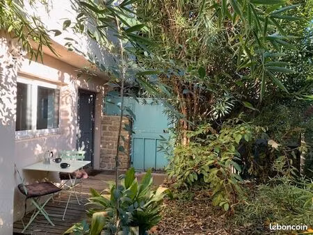 studio agréable rez-de-jardin : quartier très recherché