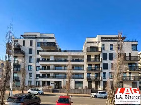 braine-l'alleud - app. 2 ch. avec terrasse sud + p. à louer