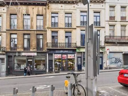 une maison de commerce et de rapport