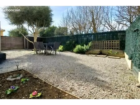 t3 62 m2 rdj avec extérieur 100m2 et terrasse  clim et double parking