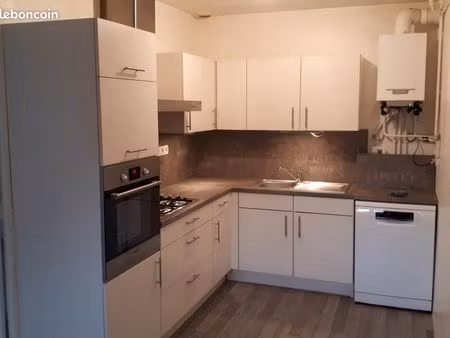 f2 rez de jardin  57 m²  état neuf