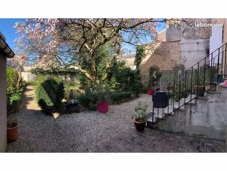 maison de ville 9 pièces – jardin avec bassin