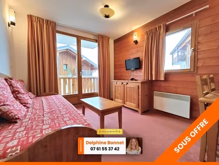 bel appartement 2p/ t2 de 28 m2 avec grand balcon dans un chalet  au pied d'une piste de s
