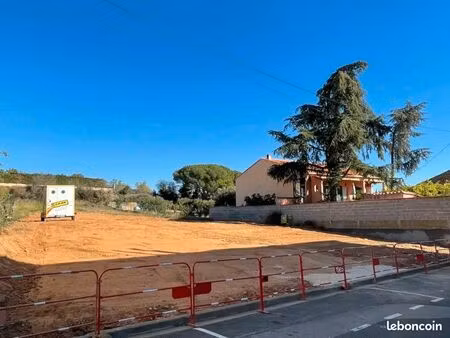 terrain 410 m² baixas