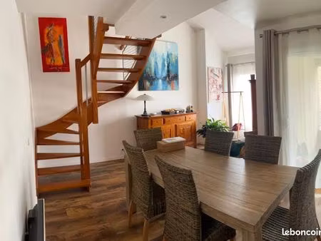 duplex avec 60 m2 de garage