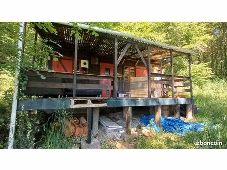 terrain boisé 1050 m² avec cabane sur pilotis – projet nature / refuge