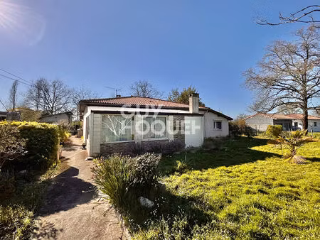 maison de plain-pied de 115 m2  4 chambres  un garage