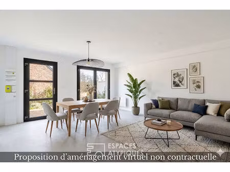 appartement rez-de-jardin rénové au coeur de saint-didier-de-formans