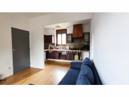 immeuble 1 appartement + local commerciale.