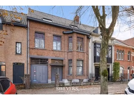 karaktervol herenhuis met 6 slaapkamers  2 badkamers en tuintje in mol