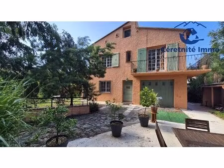 maison traditionnelle avec jardin sur ceret