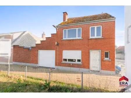 maison à rénover avec garage  jardin et potentiel de projet