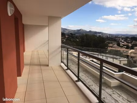 lumineux t3 de 64 m² env. avec terrasse panoramique de 23 m² + double box en sous-sol sect