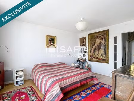 t2 vue sur seine proche commerces et transports