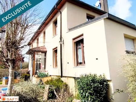 maison mitoyenne de charme avec son beau jardin d'agrément  son garage privé et sa cuisine