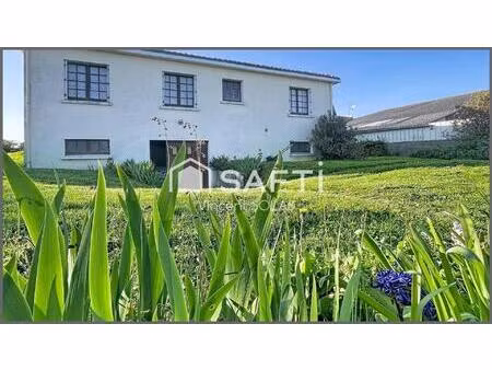 maison sur sous-sol de 100m² - jardin - garage - 3 chambres - bien entretenue