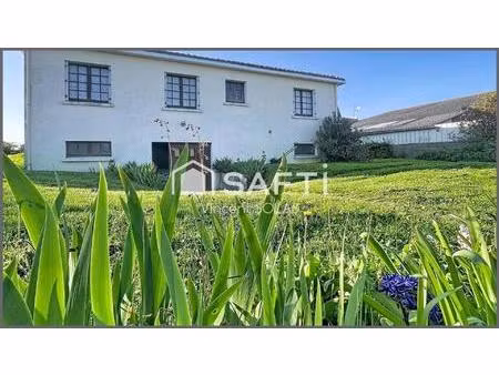 maison sur sous-sol de 100m² - jardin - garage - 3 chambres - bien entretenue
