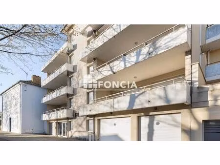 t3 de 78m2 au centre ville traversant  double terrasse  cave  parking couvert!