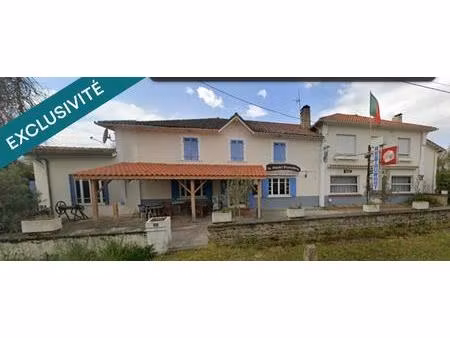 espace commercial + 2 appartements