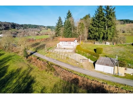 maison 70 m2  2 chambres  terrain clos et arboré de 1 425 m2  vue dégagée  calme  double g