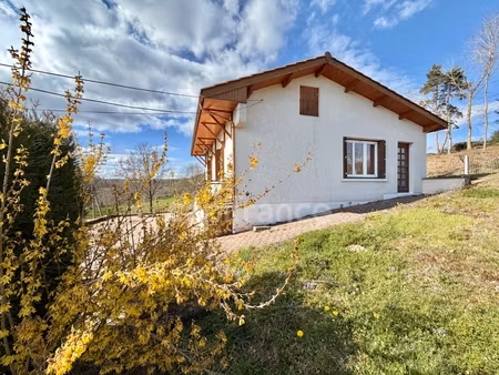 maison 70 m2  terrain clos de 1 425 m2  2 chambres  double garage  double vitrage pvc  tf 