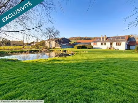 maison à rénover avec étang et dépendances.