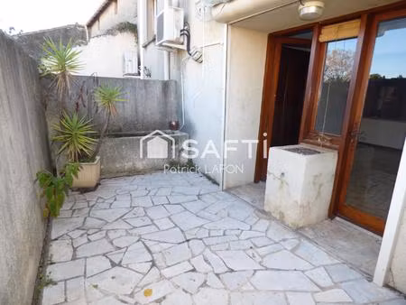 immeuble 3 appartements terrasses et garage.