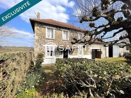 jolie maison ancienne avec garage  cadre de rêve!