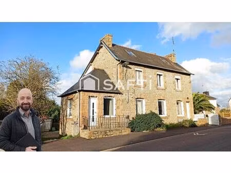 grande maison en granite dans une commune du littoral