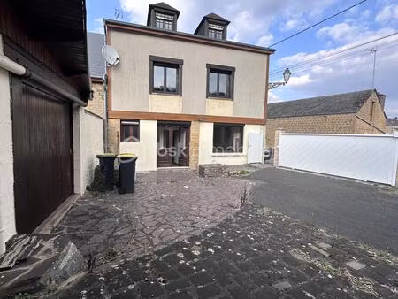 immeuble 2 logements + 2 garages – rentabilité brute ≈ 10 2 %