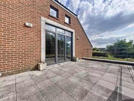 appartement avec vaste terrasse dans un cadre verdoyant