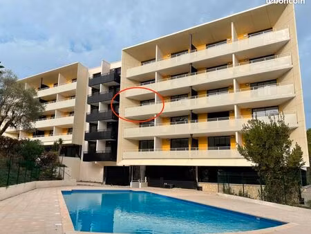 appartement 31 22m2 + place parking + piscine zone arborée