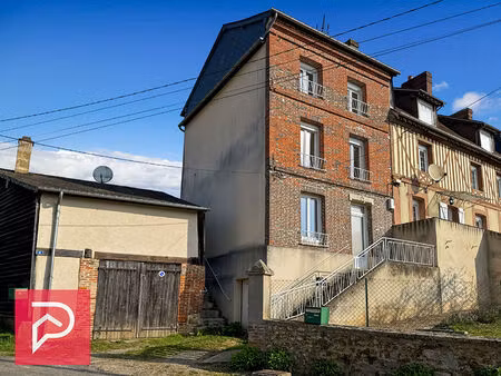maison de ville rénovée avec jardin et garage